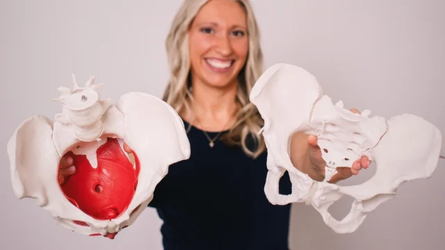 Dr. Jen holding pelvic bone structures